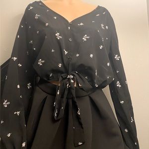 Black long sleeve crop top with floral print by forever 21. Size M